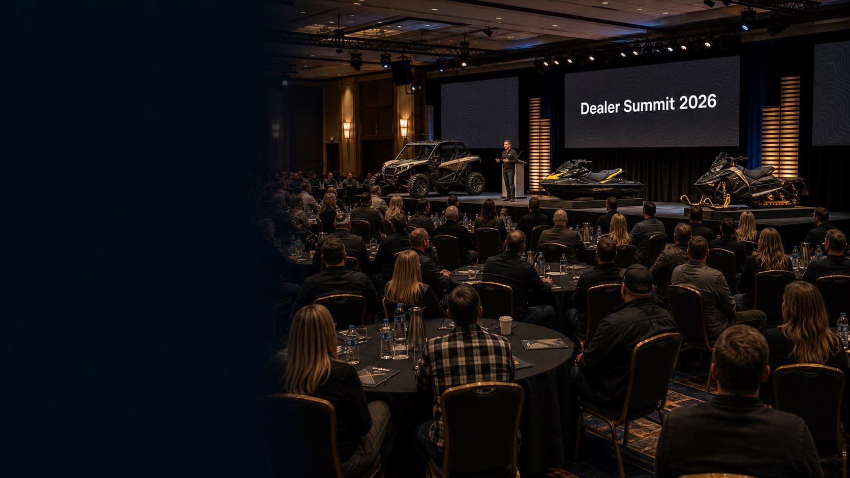 OEM dealer network summit with powersports products on stage.